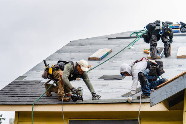 Professional Roofing technician working in Hood, VA